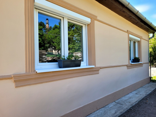 Zijaanzicht huis slaapkamers.